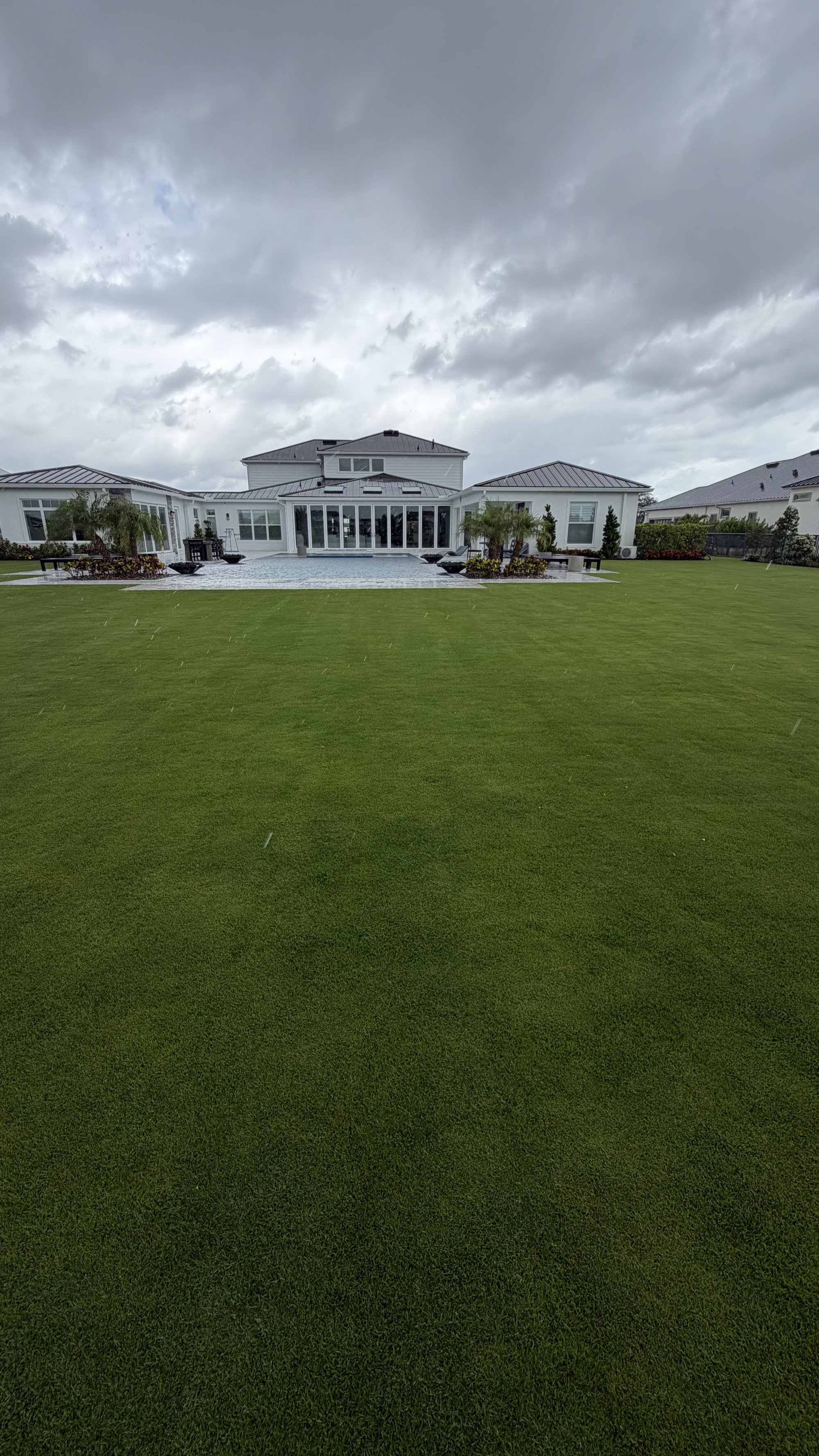 After — fully sodded estate lawn by JJ Landscape